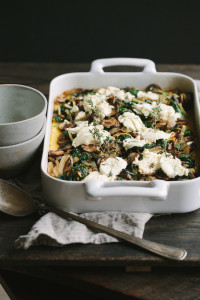 Ricotta Goat Cheese Polenta Bake with Mushrooms, Greens, and Caramelized Onions